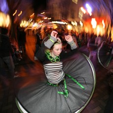 Child spinning in costume