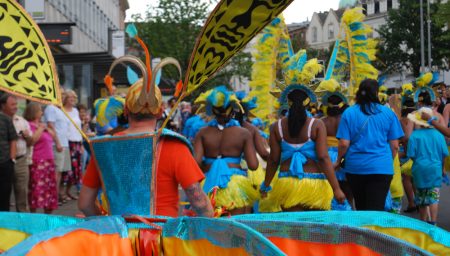 Costumed man in Caribbean Carnival
