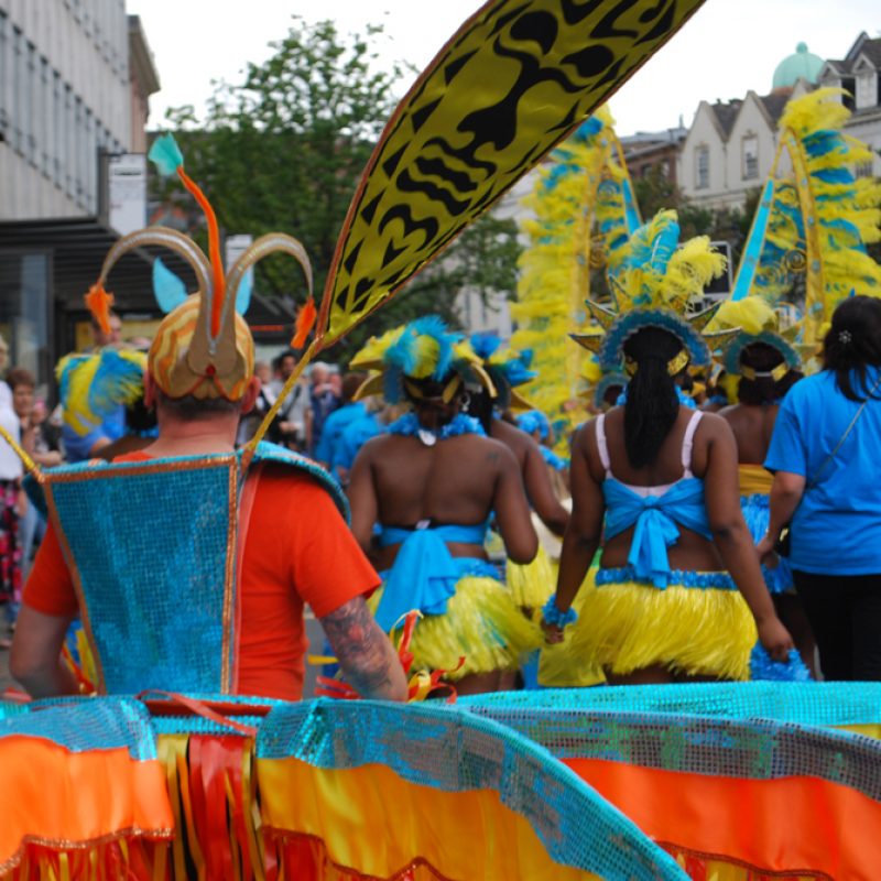 Costumed man in Caribbean Carnival