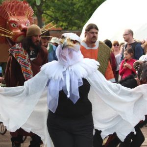 Performer wearing bird costume