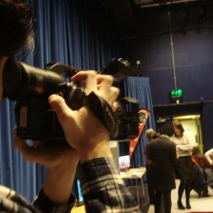 Young person films event
