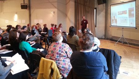 Speaker talks to audience