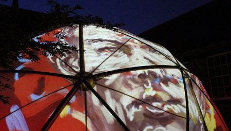 Mik Godley projects drawing onto skin of City Arts Dome