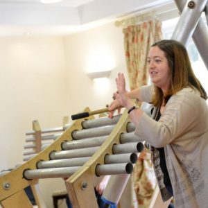 Woman plays chimes