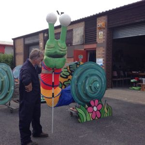 Building snail carnival float