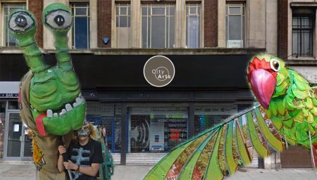 Bird and Snail superimposed on building