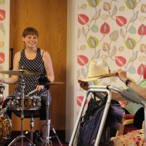 Care home residents enjoy musical performance