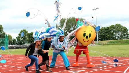 Carvinal Queen and CP Games Mascot on starting line