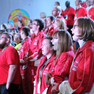 Athletes at sporting event's closing ceremony