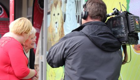 Camera man filming interactive artwork