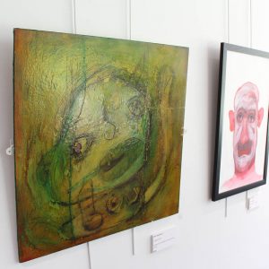 Paintings hung in exhibition