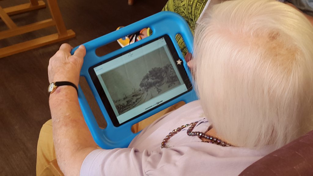 Older person using iPad app
