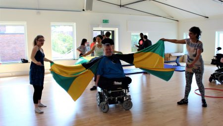 Disabled performer with flags