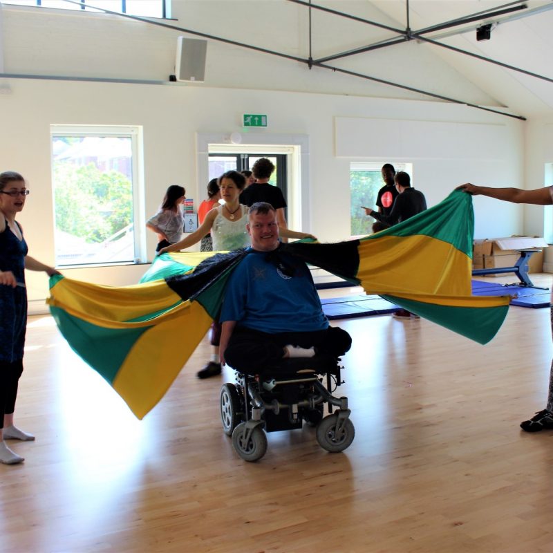 Disabled performer with flags