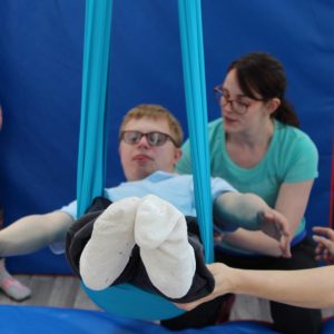 Disabled and no-disable performers try arial circus skills