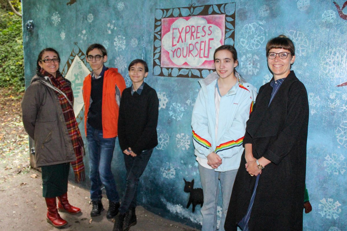 Participants with their mural