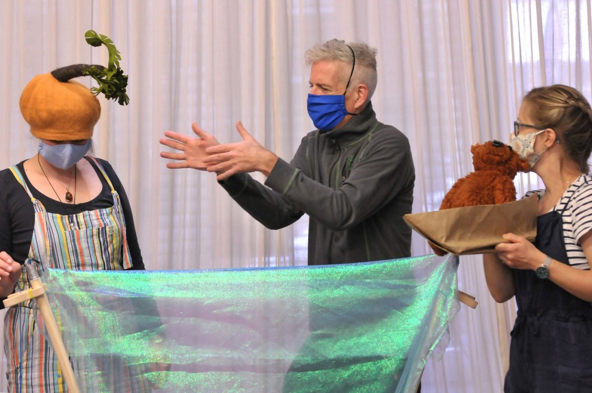 Masked puppet show rehersal