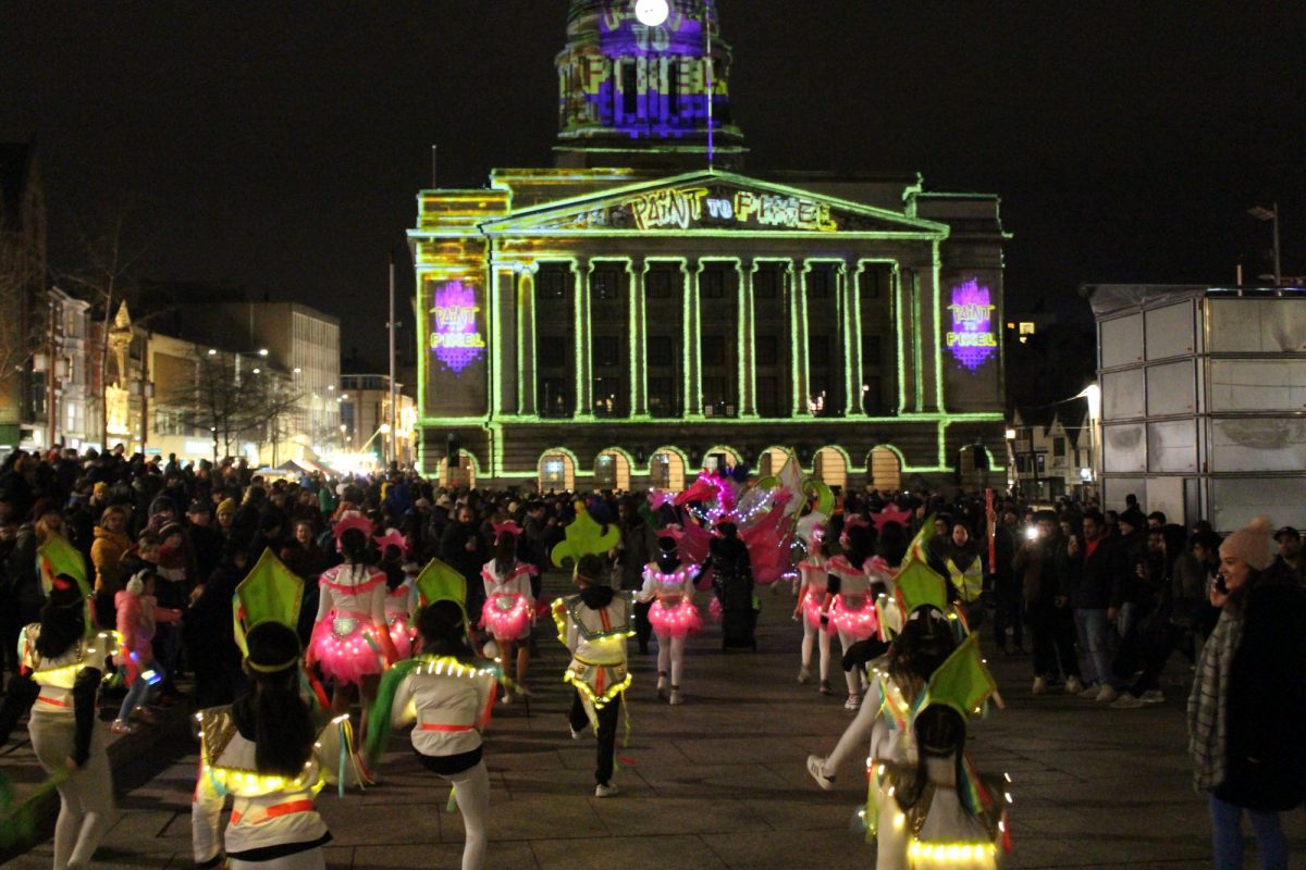 Carnival parade enters Nottingham's Old Market Square