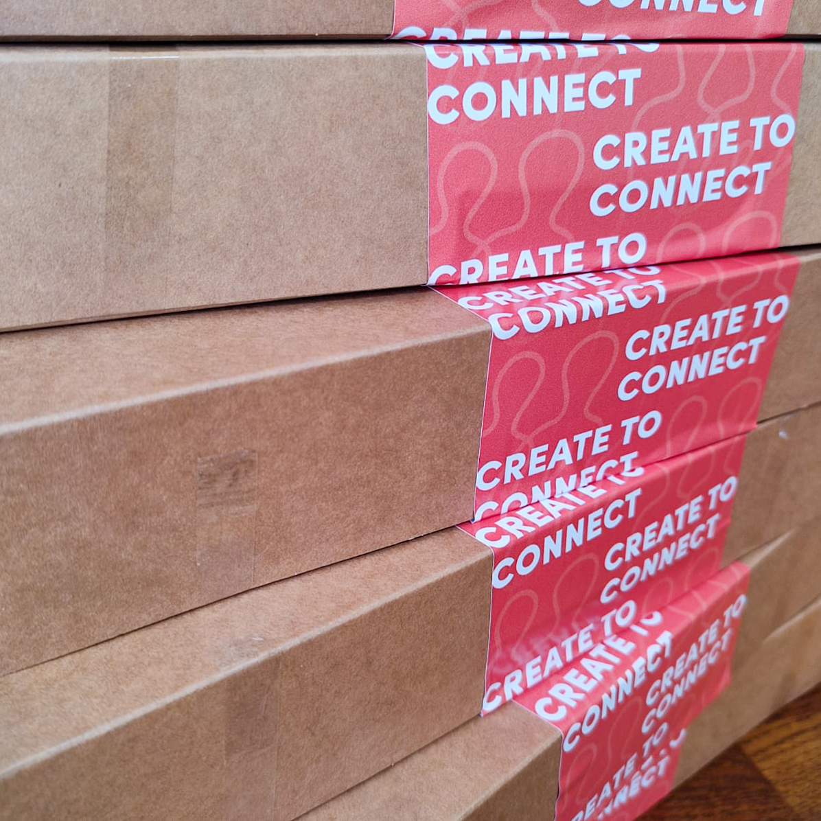 A stack of boxes with labels saing create to connect