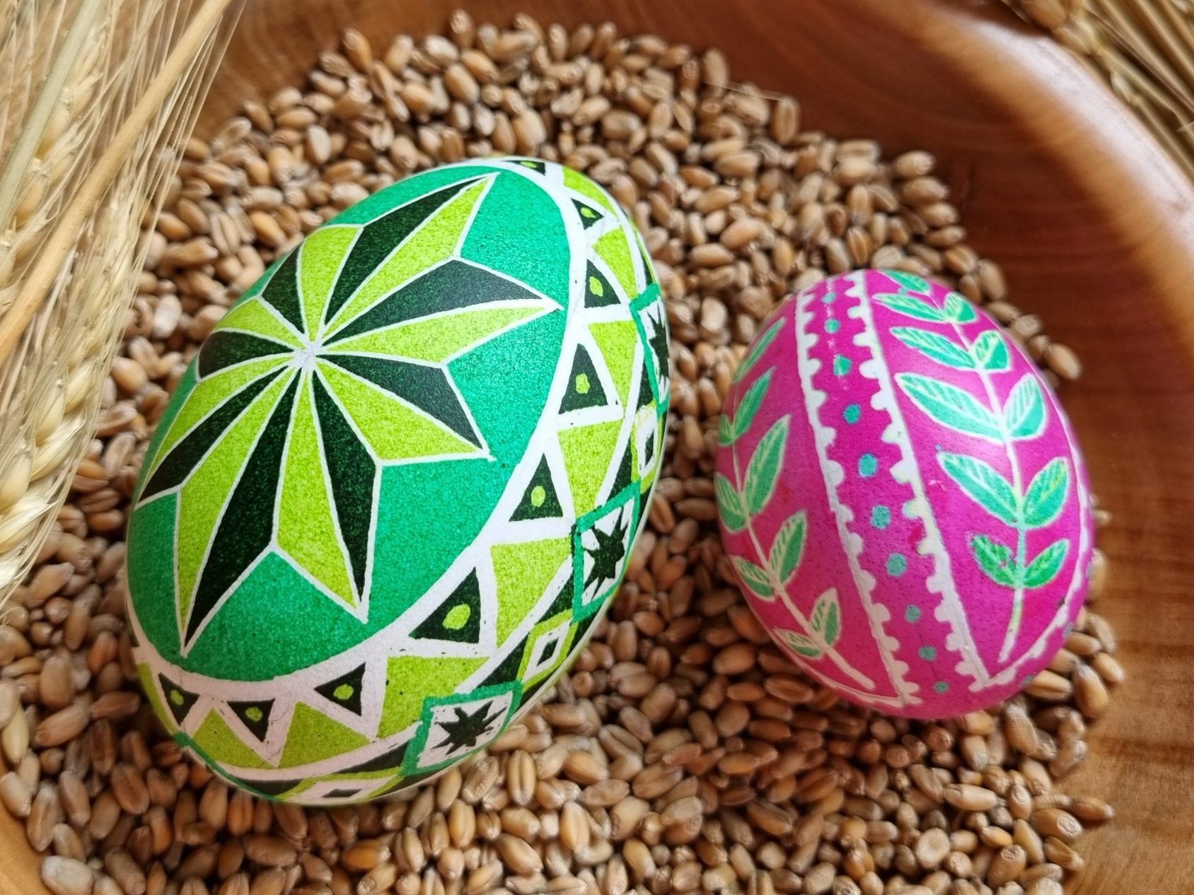 Two Pysanky Eggs in a Wooden Bowl