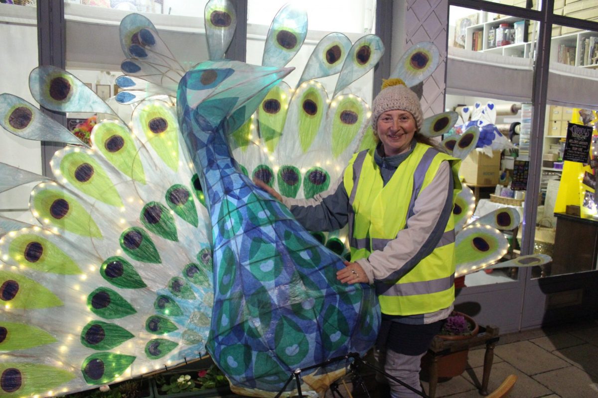Jessica Kemp with willow and tissue paper peacock lantern