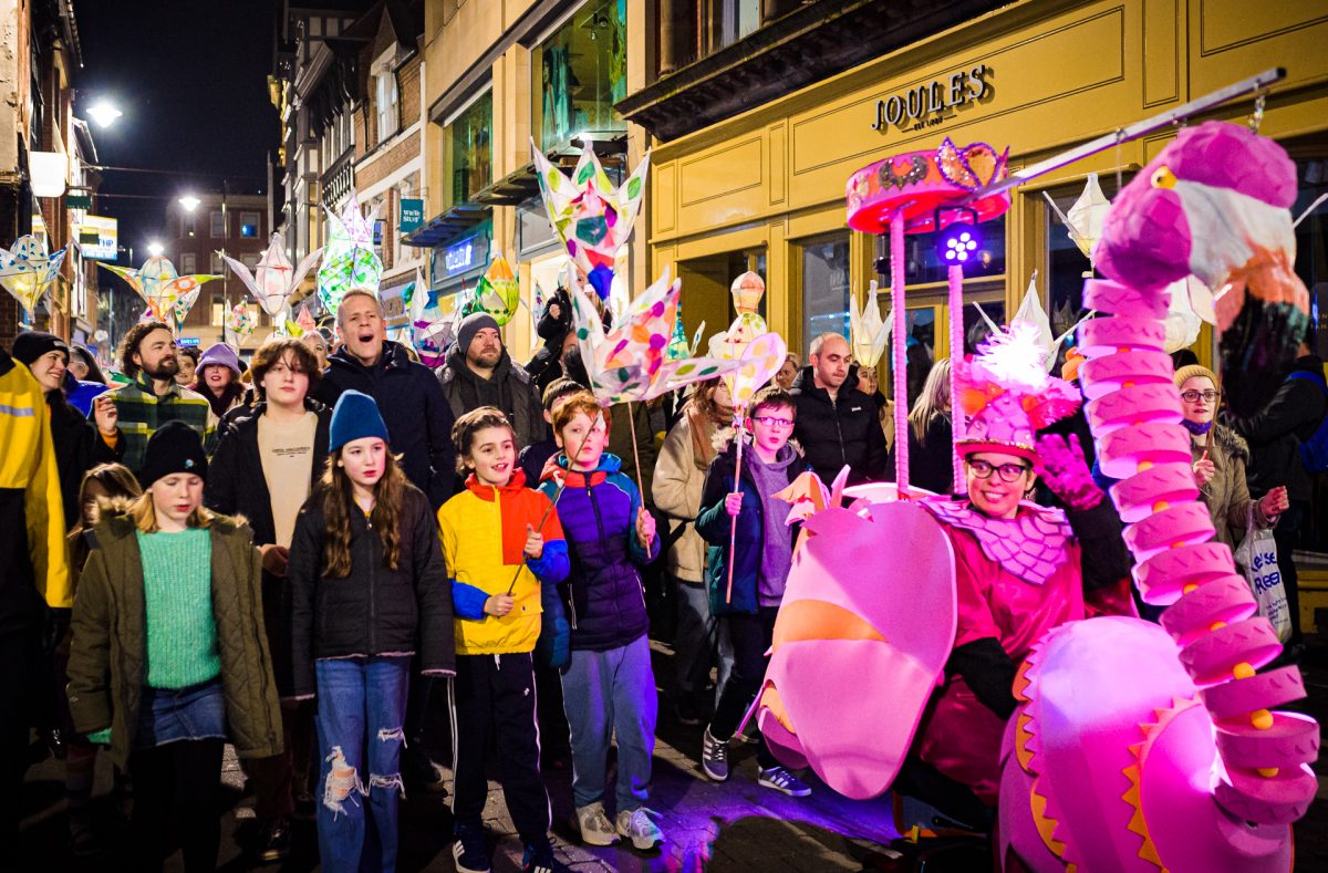 Lantern parade with flamingo puppet