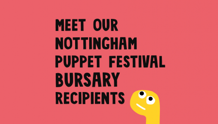 Promotional graphic with a vibrant coral background featuring bold black text that reads 'MEET OUR NOTTINGHAM PUPPET FESTIVAL BURSARY RECIPIENTS'. To the right side of the text, there is a whimsical illustration of a yellow puppet character with a surprised expression, peeking into the frame.
