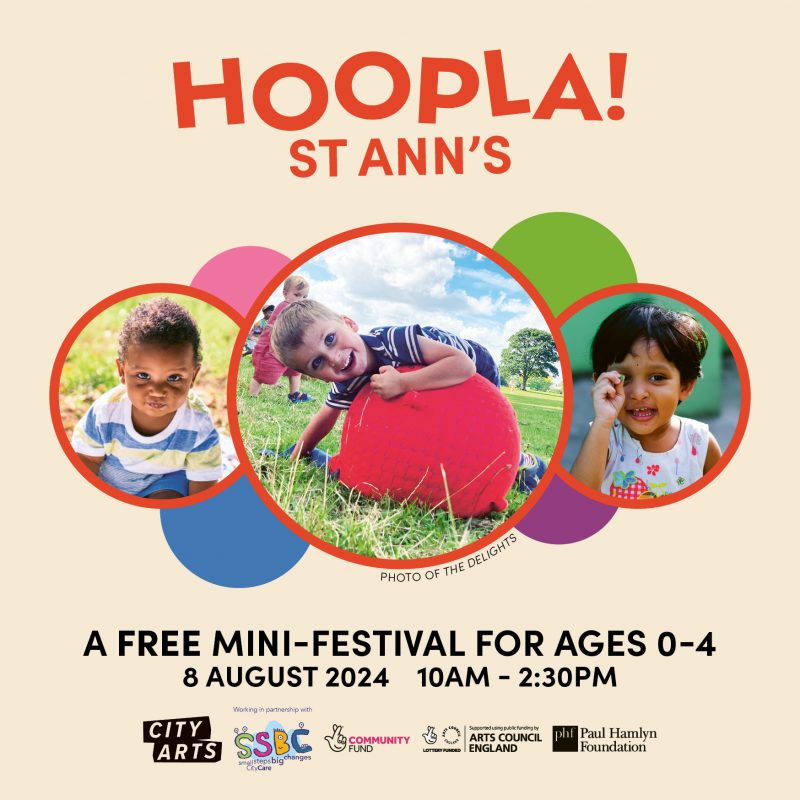 Promotional poster for 'Hoopla! St Ann's', a free mini-festival for ages 0-4, scheduled for 8 August 2024 from 10AM to 2:30PM. The poster features three circular photos of young children: on the left, a smiling child in a striped shirt; in the center, a boy playing on the grass with a large red ball; and on the right, a child smiling and holding a finger to their mouth. The text includes logos of City Arts, SSBC, Community Fund, Arts Council England, and Paul Hamlyn Foundation,
