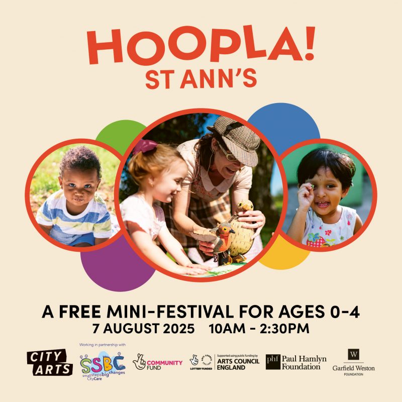 Promotional poster for 'Hoopla! St Anns', a free mini-festival for children aged 0–4. The event takes place on 7 August 2025 from 10 AM to 2:30 PM. The design includes bold colours and three circular photos: a young boy sitting outdoors, a performer entertaining two young girls with puppets, and a smiling girl holding her fingers to her eye. Logos of supporting organisations appear at the bottom, including City Arts, SSBC (Small Steps Big Changes), Community Fund, Arts Council England, Paul Hamlyn Foundation, and Garfield Weston Foundation.