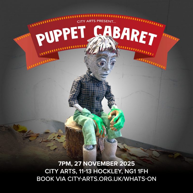 A handmade puppet with a paper-maché face, grey hair and green hands sits on a small tree-stump prop, surrounded by scattered leaves on the floor. Above the puppet is a red ribbon banner with the words: ‘CITY ARTS PRESENT… PUPPET CABARET’. At the bottom of the image, white text reads: ‘7PM, 27 NOVEMBER 2025. CITY ARTS, 11–13 HOCKLEY, NG1 1FH. BOOK VIA CITY-ARTS.ORG.UK/WHATS-ON’.