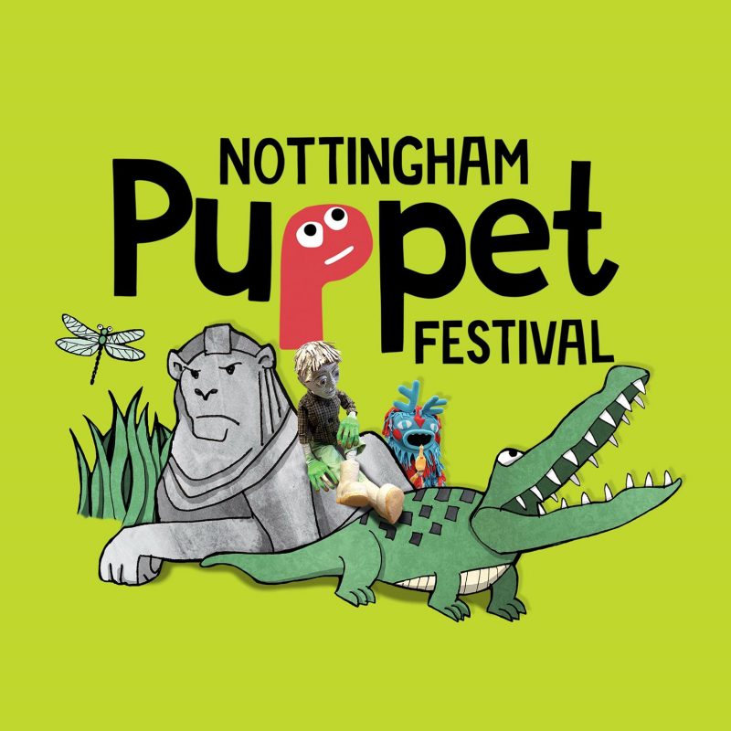 Bright green promotional graphic with the text ‘NOTTINGHAM Puppet FESTIVAL’. The word ‘Puppet’ features a pink puppet-shaped letter ‘P’ with cartoon eyes. Illustrated characters include a grey stone lion, a green crocodile with sharp teeth, a dragonfly, grass, and two colourful puppets sitting on the crocodile’s back, including a handmade figure with large eyes, green gloves and white boots.